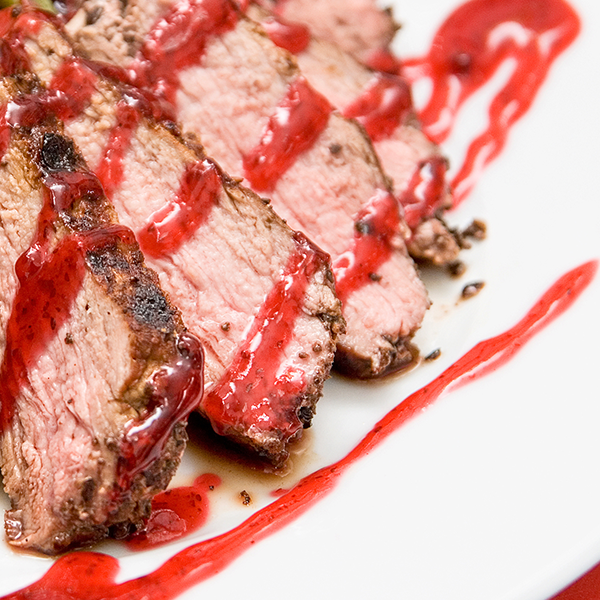 Pork Loin with Pomegranate & Walnut Sauce, Served with Radiccio
