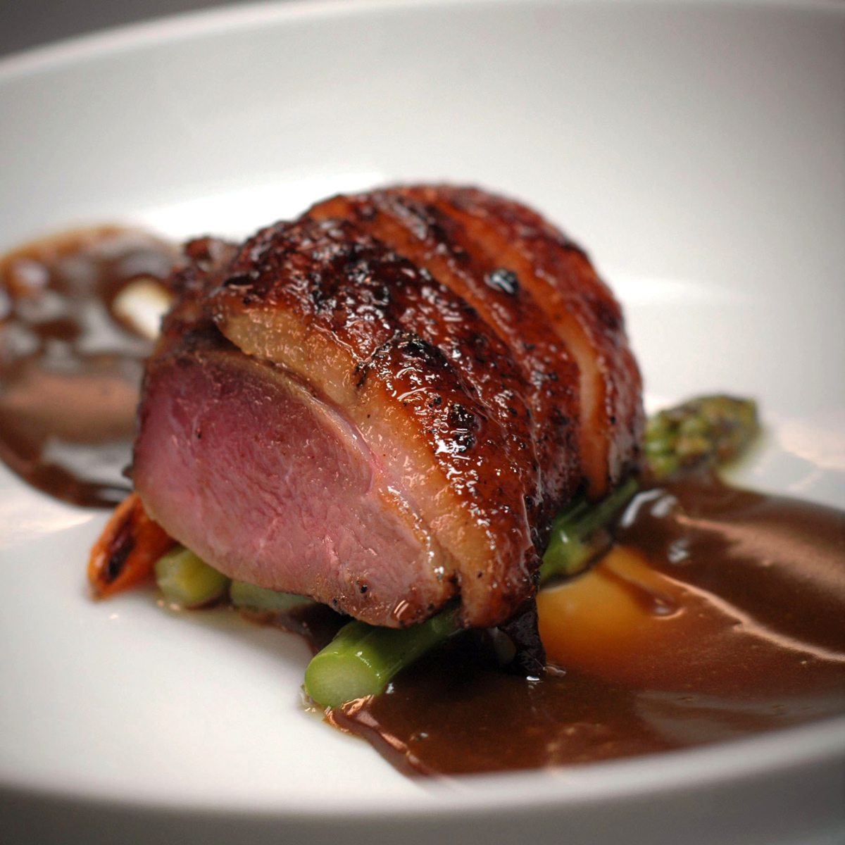 Roasted Duck with Cumin and Honey Glaze, Duck Fat-Poached Asparagus and Tamarind Curd