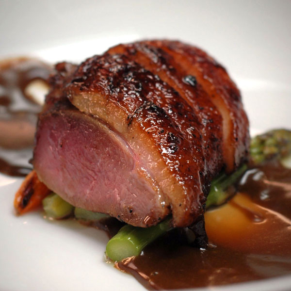 Roasted Duck with Cumin and Honey Glaze, Duck Fat-Poached Asparagus and Tamarind Curd