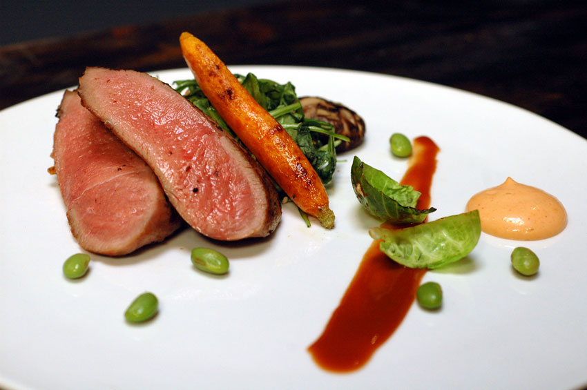 Tamarind Duck with Arugula and Soy Guava Reduction
